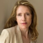 Portrait of woman in beige blazer